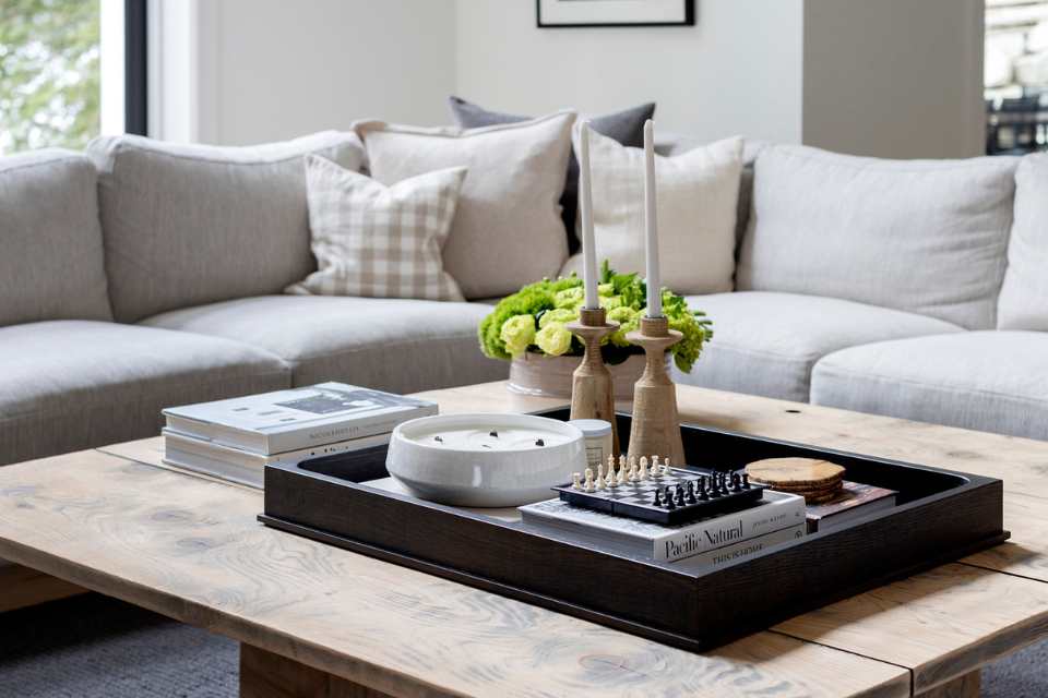 coffee table with neutral colors in lake house living room 